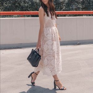 White lace dress with an open back